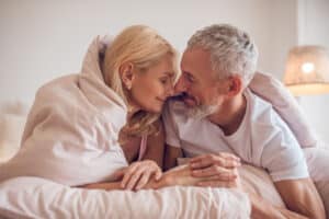 Happy,Morning ,Middle aged,Couple,Having,Romantic,Moment,In,Bedroom